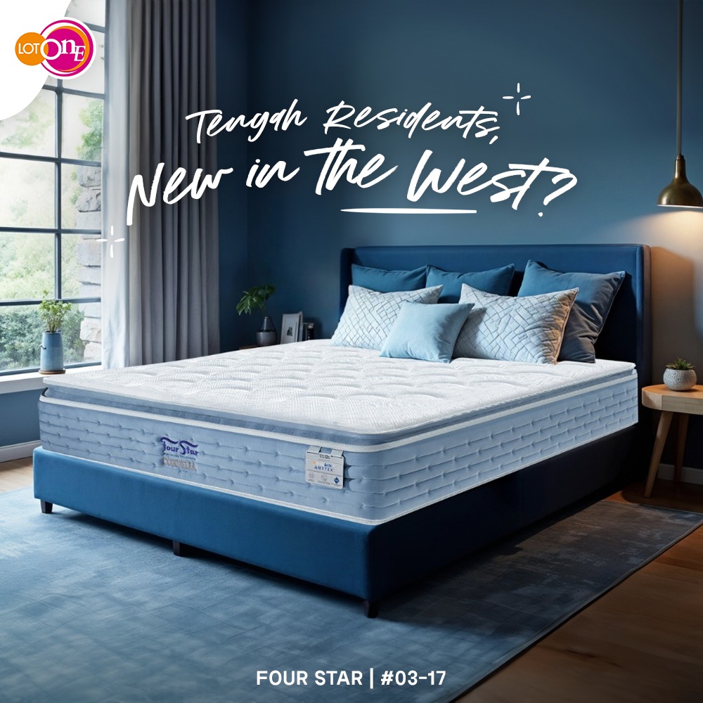 A beautifully made bed with luxurious, soft bedding