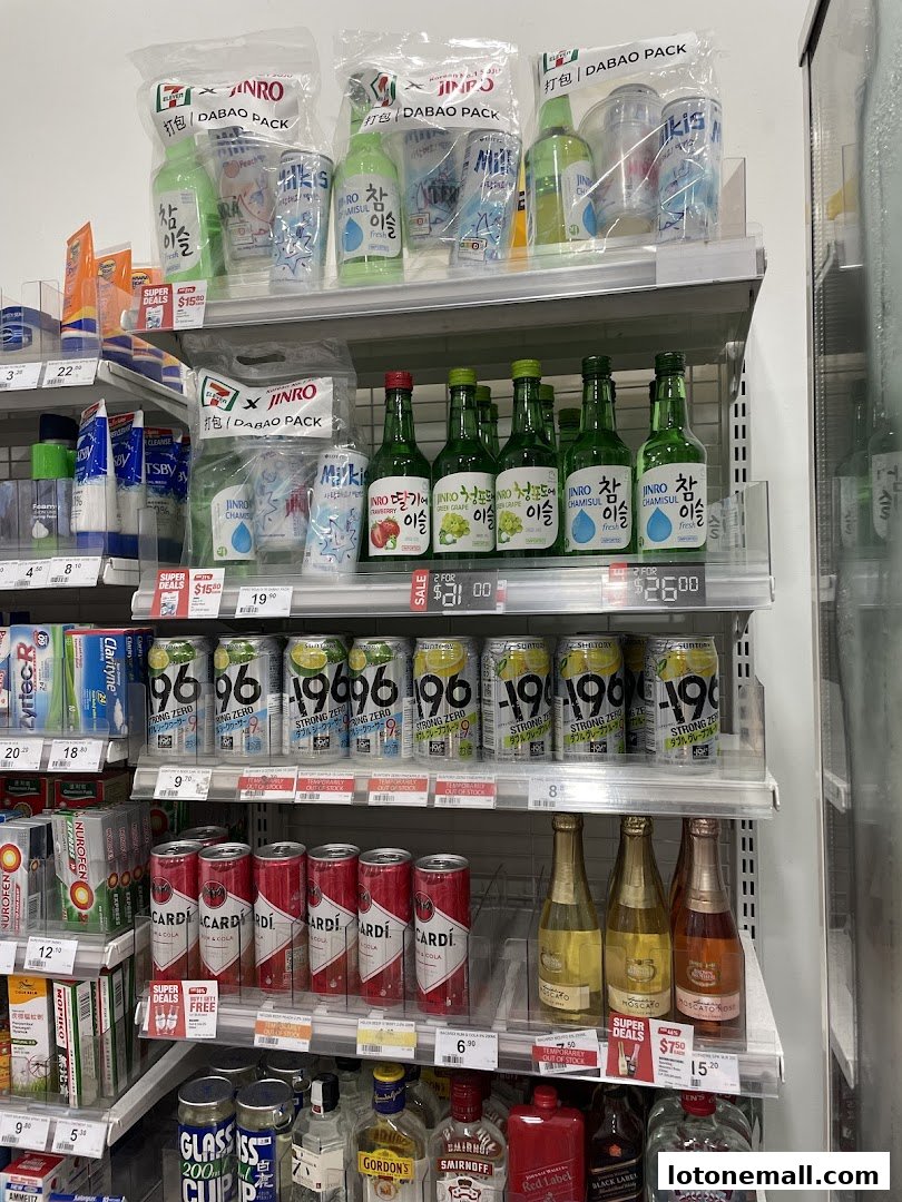 Shelves stocked with various beverages including Jinro soju, 196 Strong Zero, and Bacardi Breezers.
