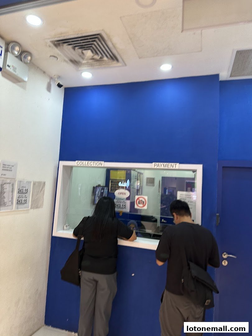 Customers interact with staff at the counter of A R J Money Changer.