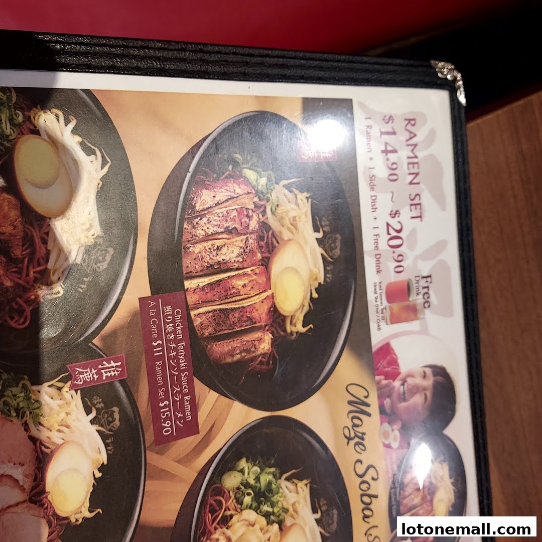 A menu featuring various ramen dishes, including a ramen set with a free drink.