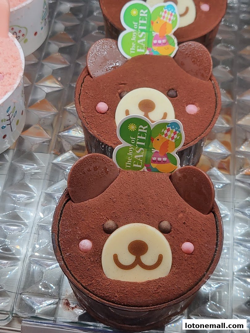 Adorable bear-shaped chocolate cakes with festive Easter decorations.