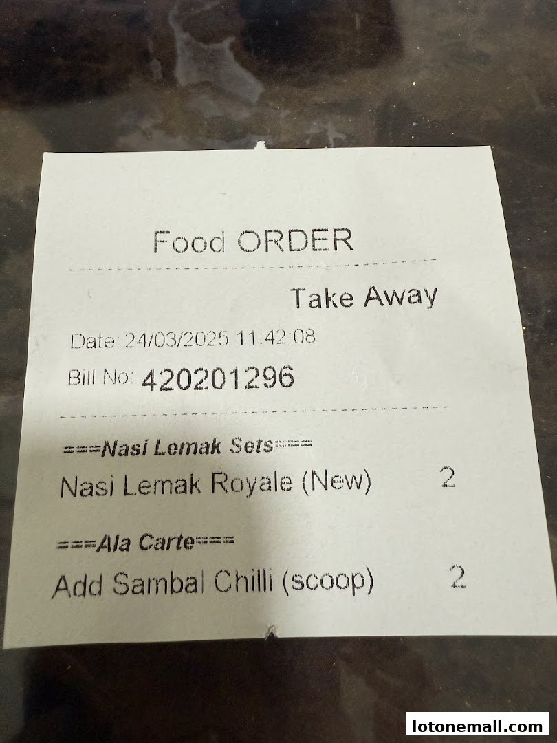 A food order receipt from Crave Nasi Lemak showing Nasi Lemak Royale and Sambal Chilli.