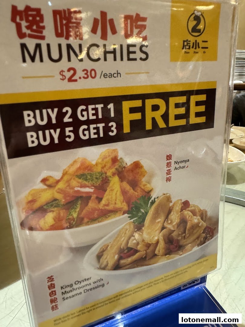 A menu board for Dian Xiao Er featuring 'Munchies' with a buy 2 get 1 free offer.