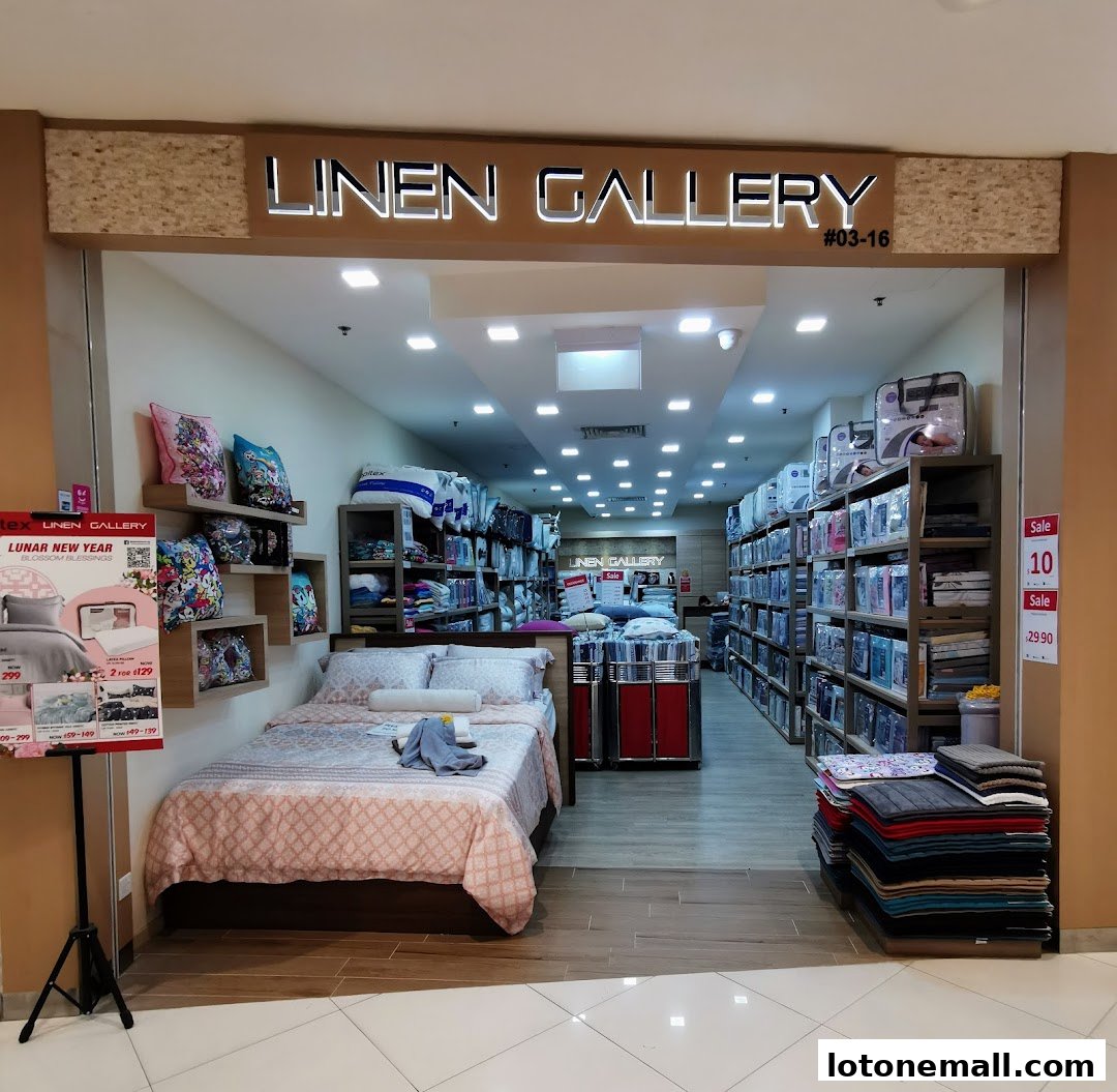 The entrance of Linen Gallery shop displaying bedding and home textiles.