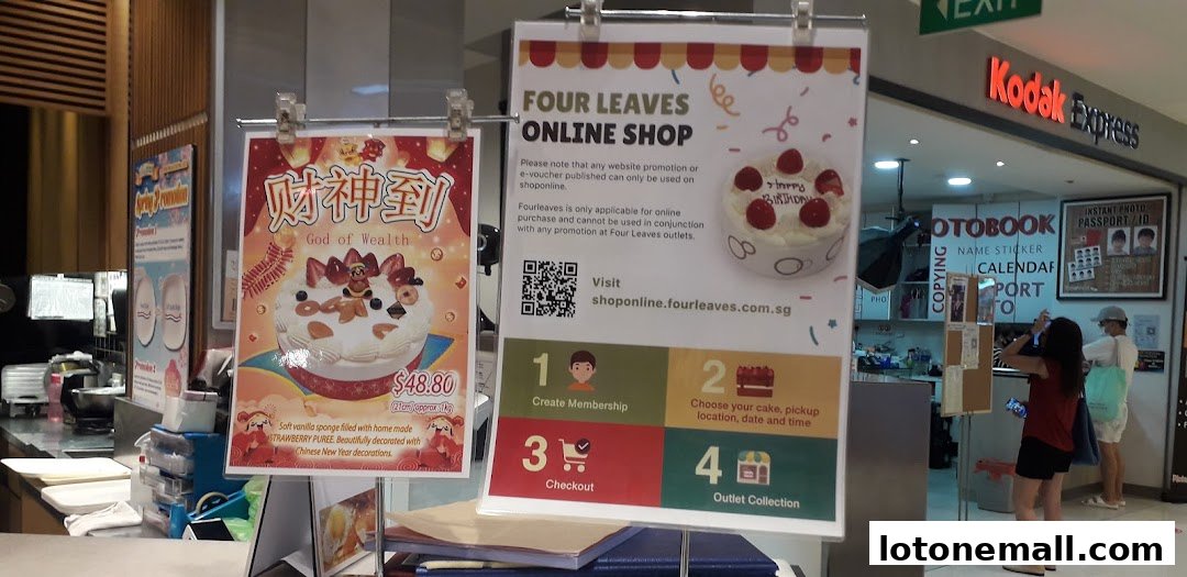Two promotional posters for Four Leaves bakery, one featuring a cake and the other detailing online ordering.