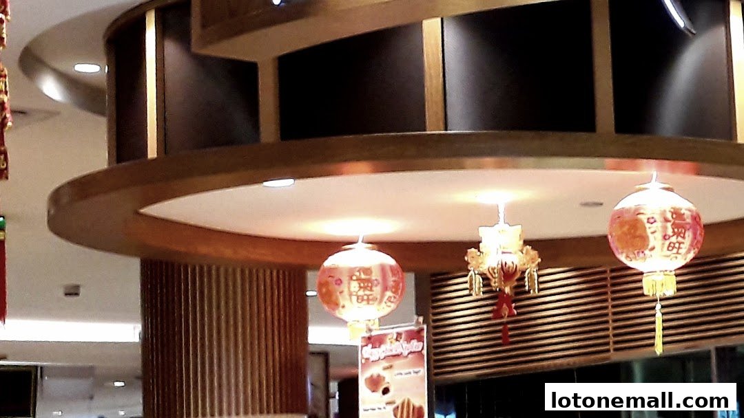 Interior shot of a shop with decorative lanterns and wooden accents.