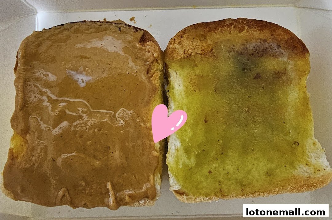 Two slices of toast, one with peanut butter and the other with butter and sugar.