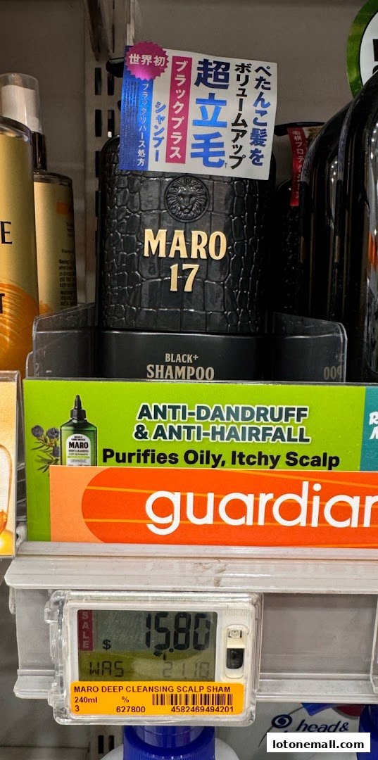 A display of MARO 17 Black+ Shampoo, highlighting its anti-dandruff and anti-hairfall benefits.