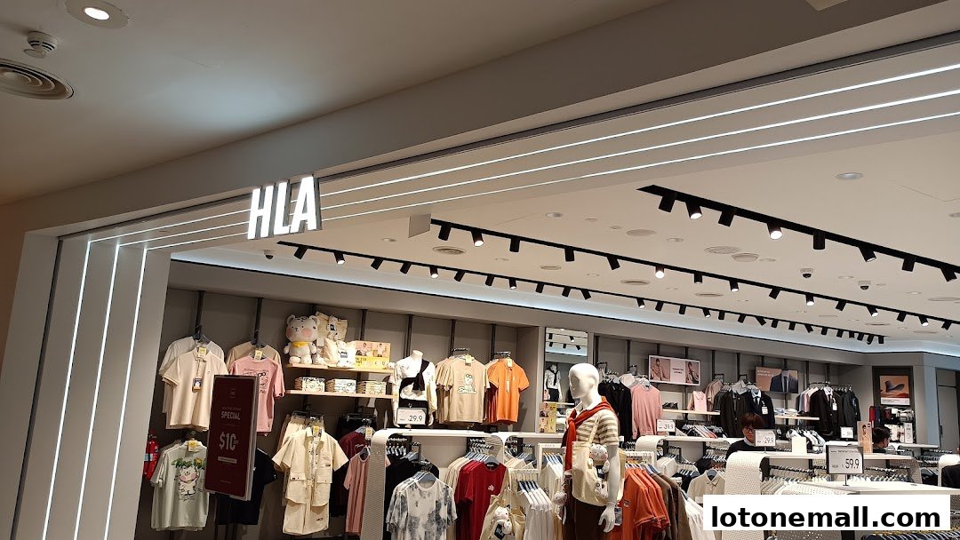 The entrance of the HLA clothing store, showcasing various apparel and mannequins.