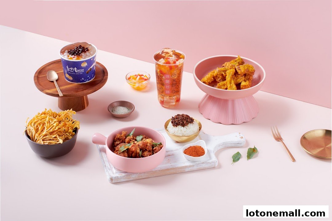 A spread of Taiwanese street food and bubble tea, featuring fried chicken, crispy mushrooms, and rice.