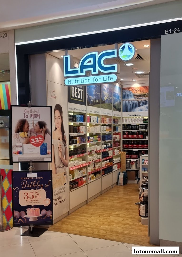 The exterior of LAC Nutrition for Life, a health and wellness store, showcasing products and promotions.