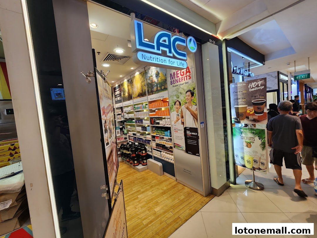 The entrance of LAC Nutrition For Life shop, showcasing health supplements and beverages.