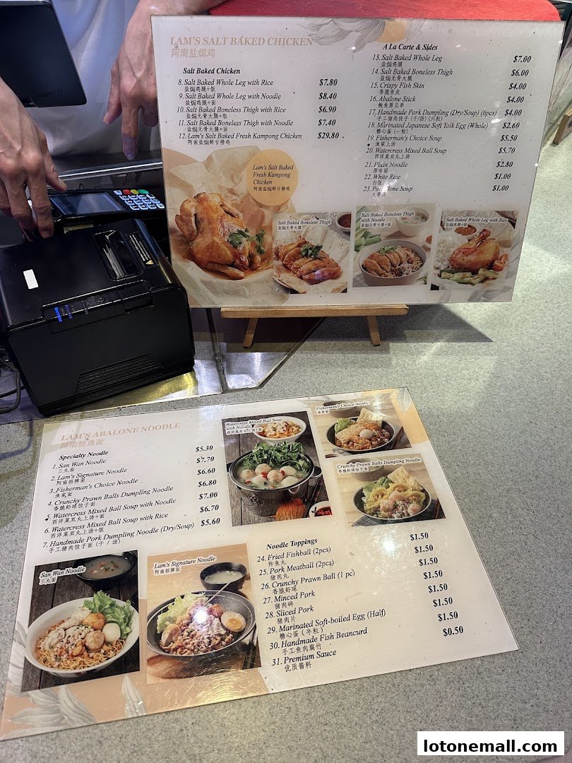 A menu displaying various noodle dishes and salt-baked chicken options with prices.