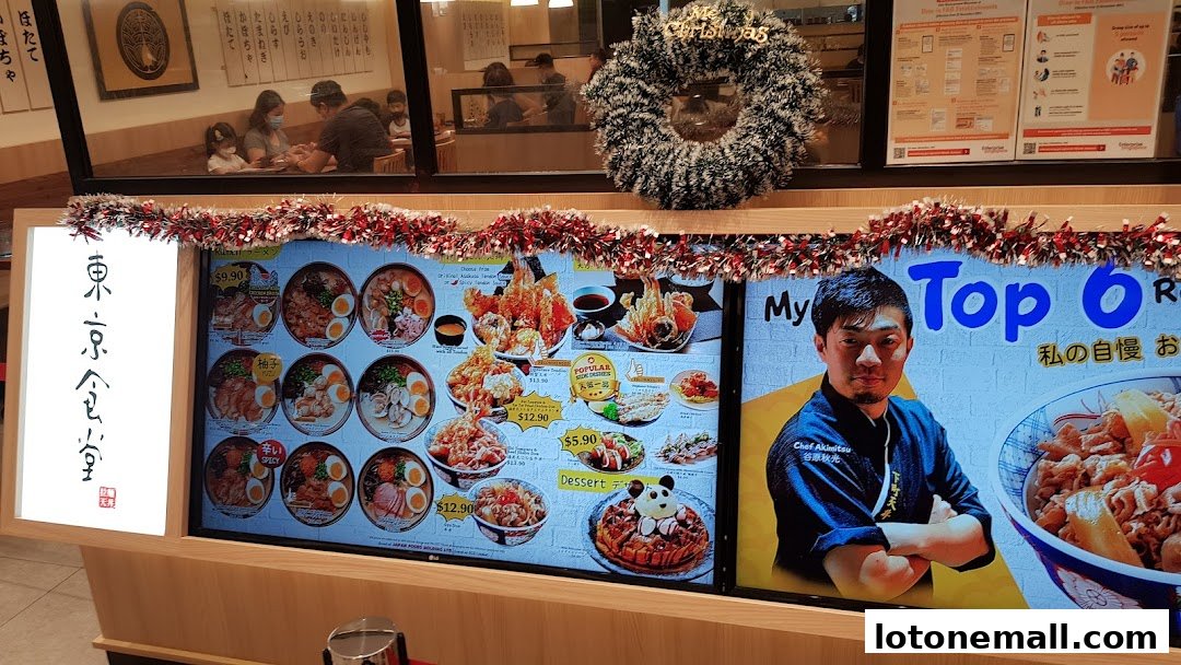 A digital menu board for Tokyo Shokudo, showcasing various Japanese dishes and a chef.