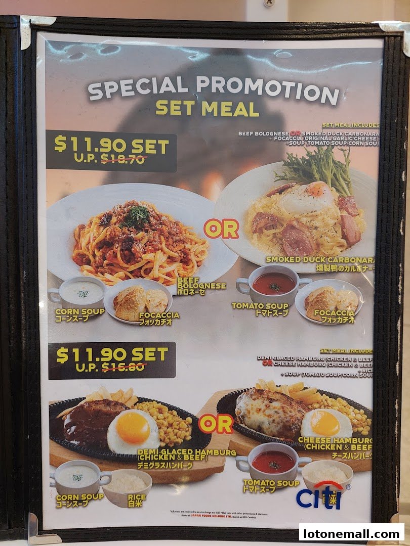 A menu board showcasing special set meal promotions with pasta and hamburger dishes.
