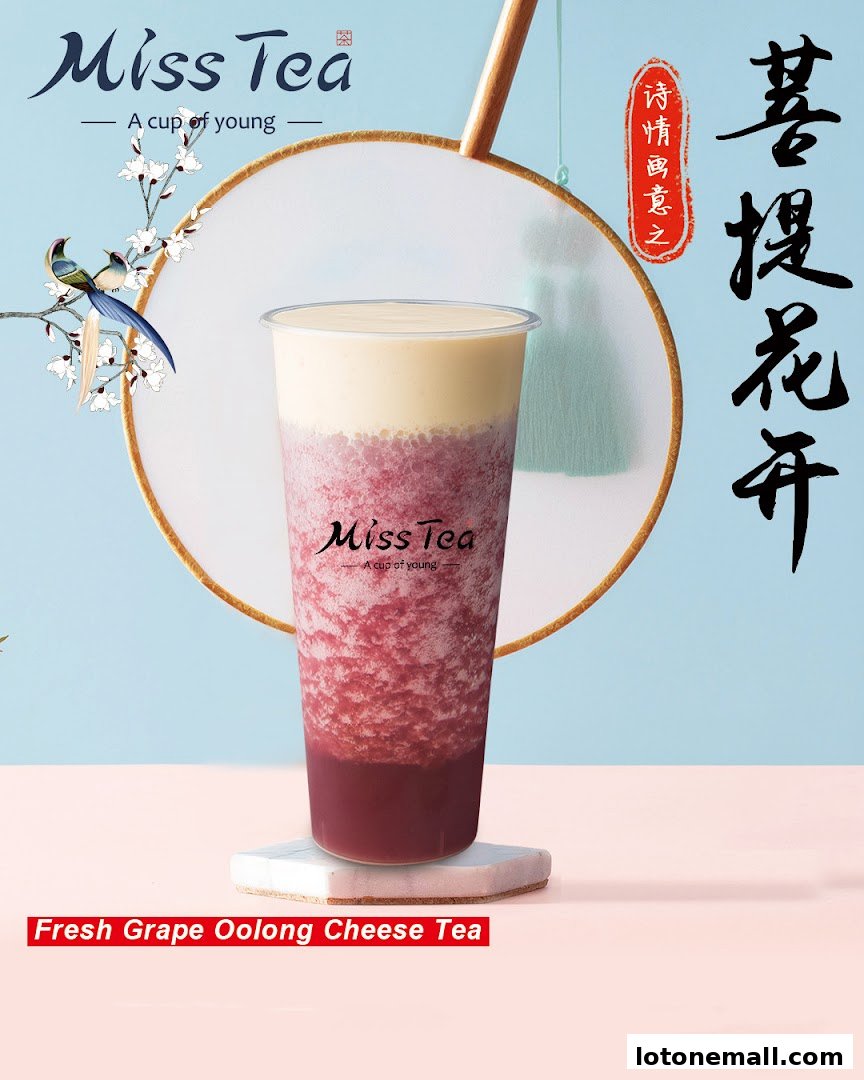 A refreshing grape oolong cheese tea from Miss Tea, presented with elegant Chinese-inspired decor.