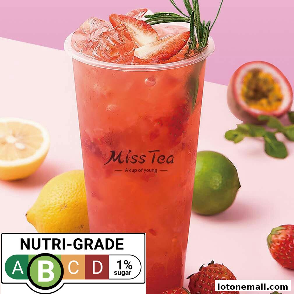 A refreshing strawberry and passion fruit tea with fresh fruits and a Nutri-Grade label.