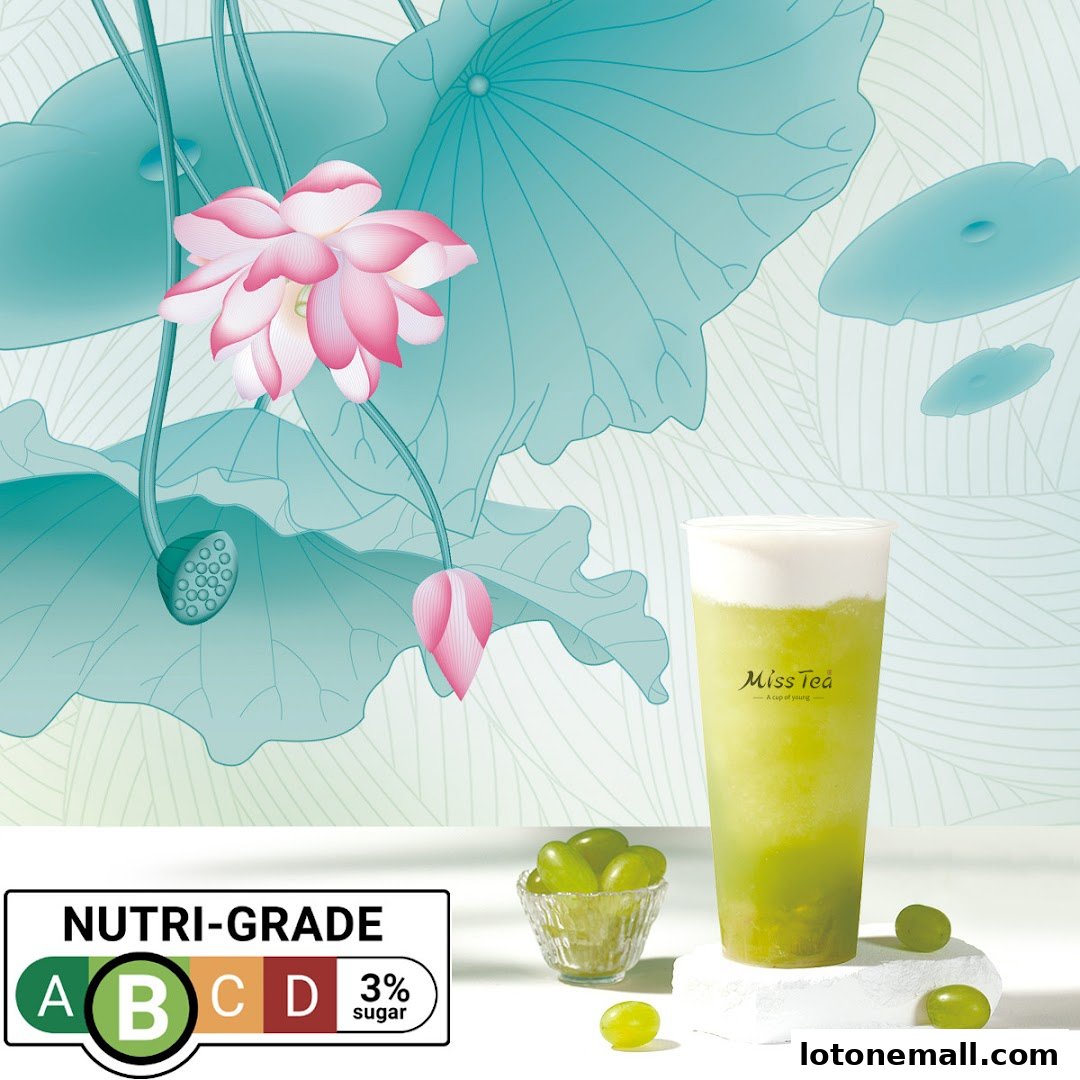 A refreshing green beverage from Miss Tea with grapes and lotus flower graphics.