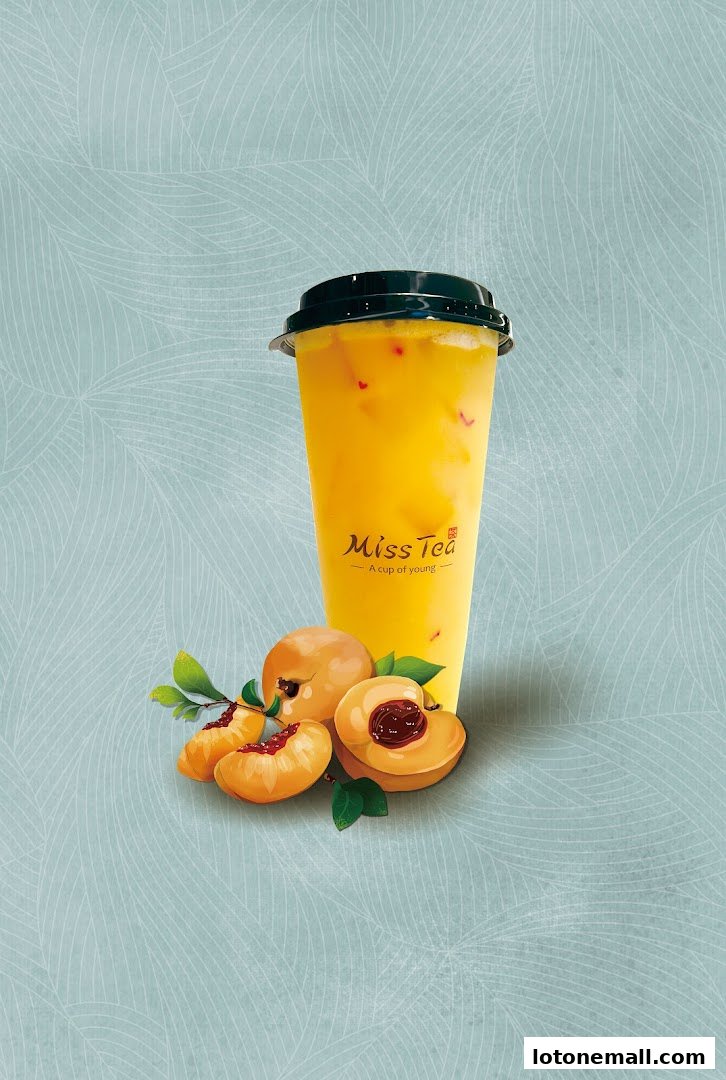 A refreshing peach-flavored drink from Miss Tea, garnished with fresh peaches.