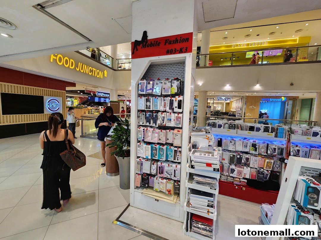 A retail display of phone cases and accessories in a shopping mall.