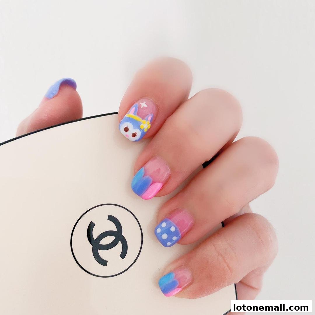 A hand with intricately designed nails featuring cartoon characters and colorful patterns.