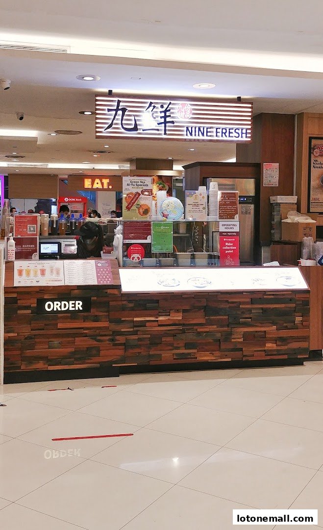 Nine Fresh Desserts Taiwan shop counter with menu and ordering signage.