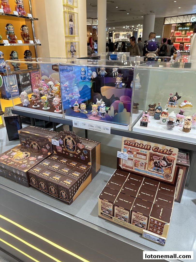 A display of collectible blind box toys from POP MART, featuring various themed collections.