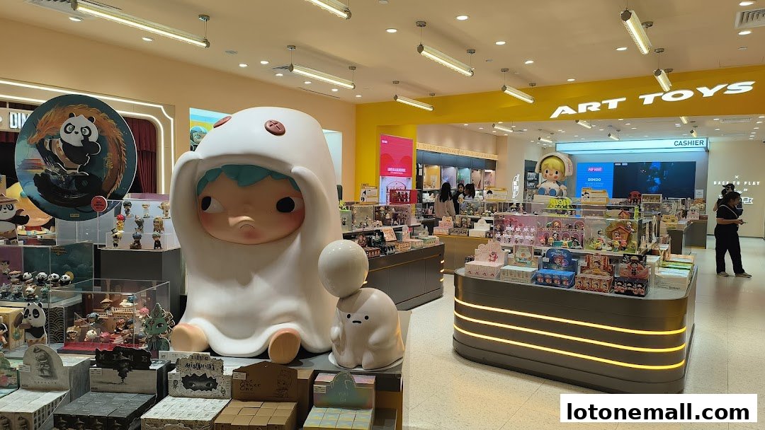 Interior of a POP MART store filled with collectible art toys and figurines.