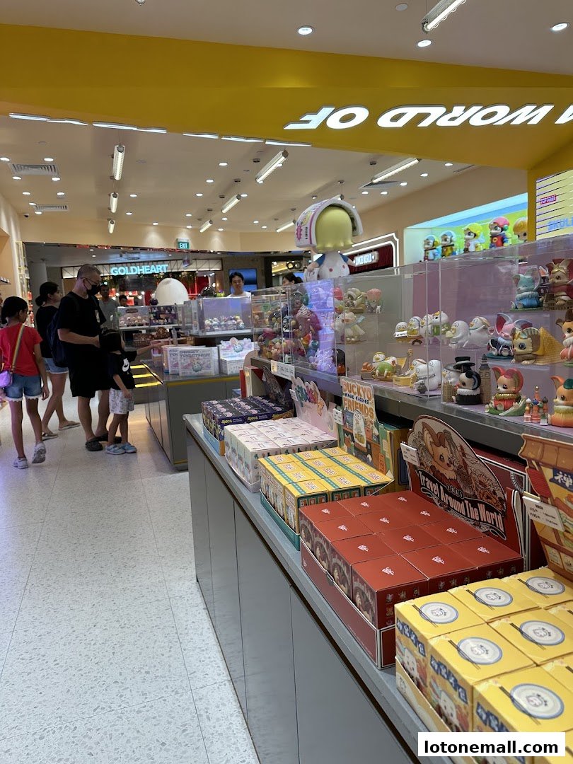 Interior of a POP MART store filled with collectible toys and figurines on display.