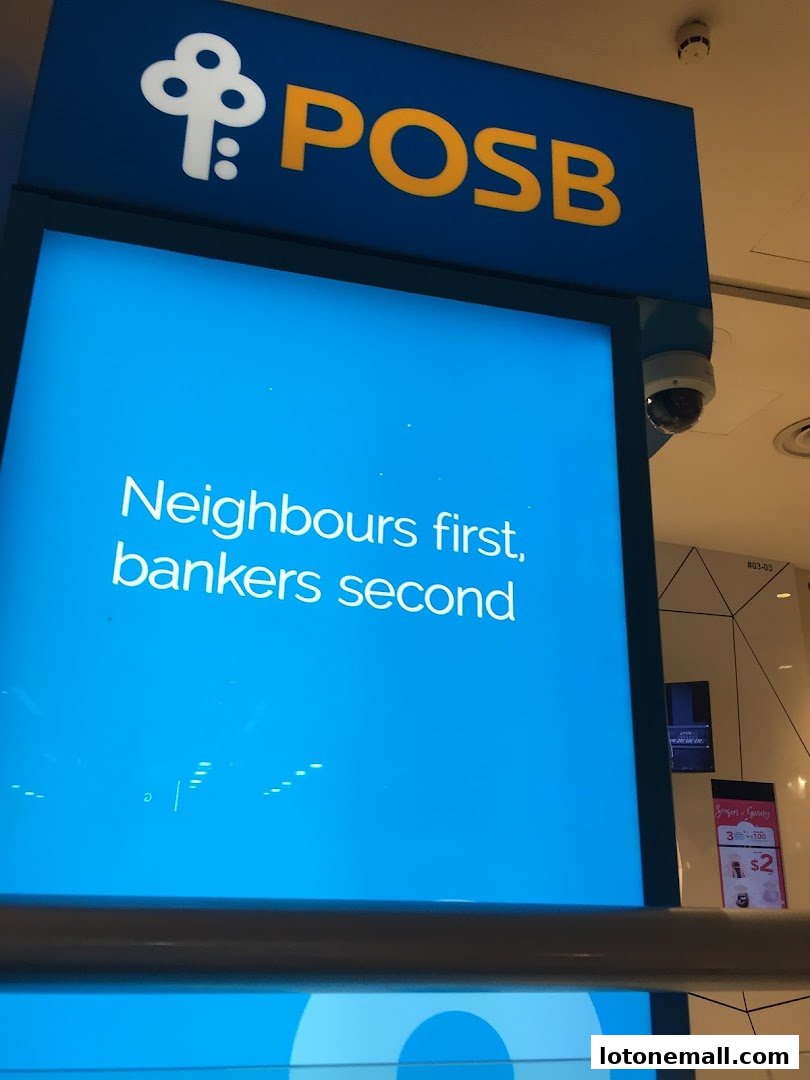 A POSB bank sign with the slogan 'Neighbours first, bankers second'.