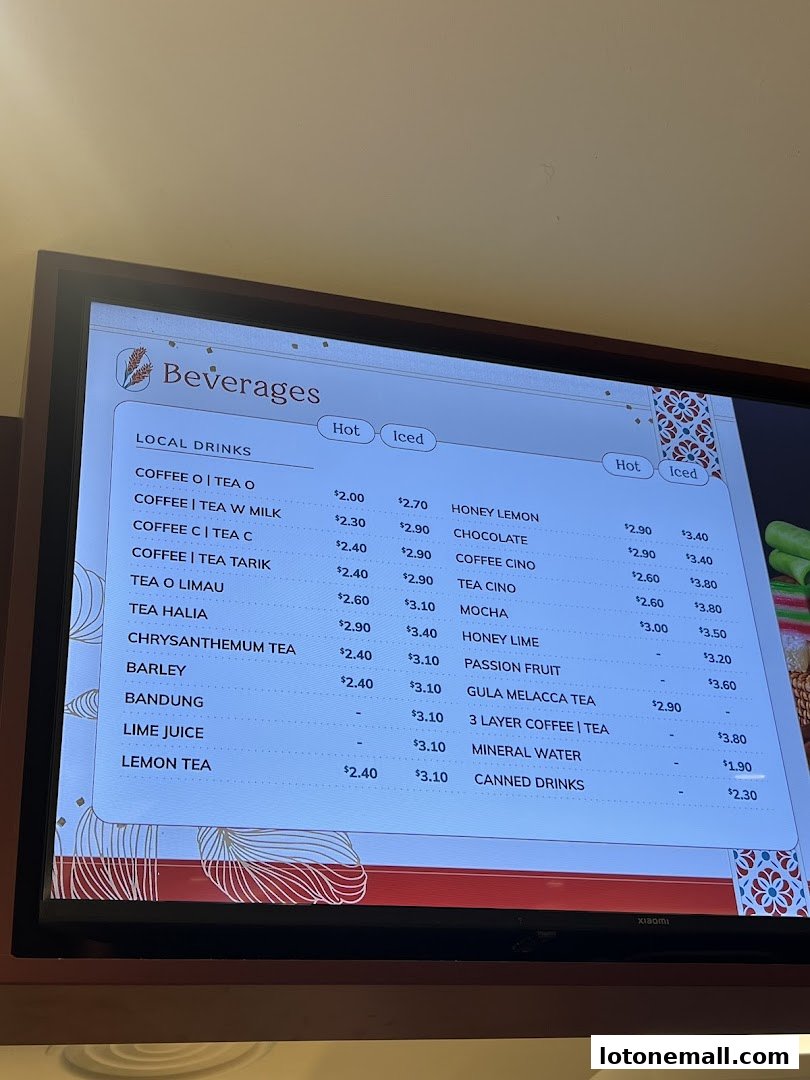 A digital menu displaying a variety of hot and iced beverages with prices.