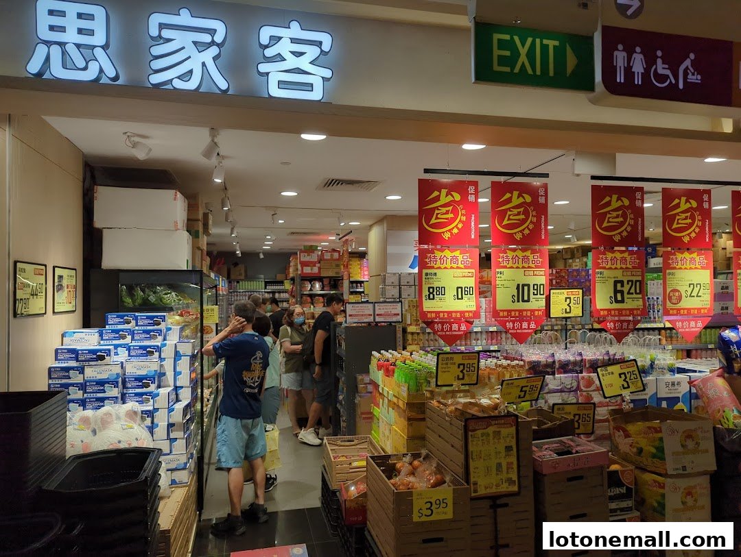 Interior view of Scarlett Supermarket with promotional banners and stocked shelves.