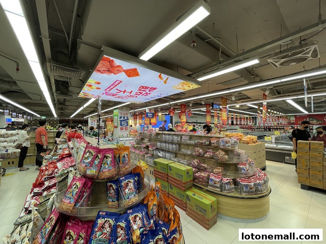 Interior view of Scarlett Supermarket with aisles of snacks and products.