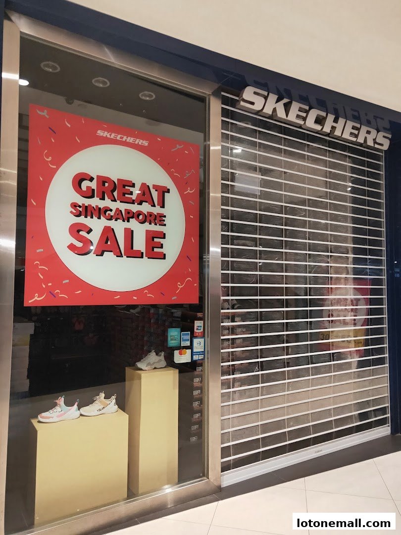 Skechers shop front with a 'Great Singapore Sale' sign and shoes displayed in the window.