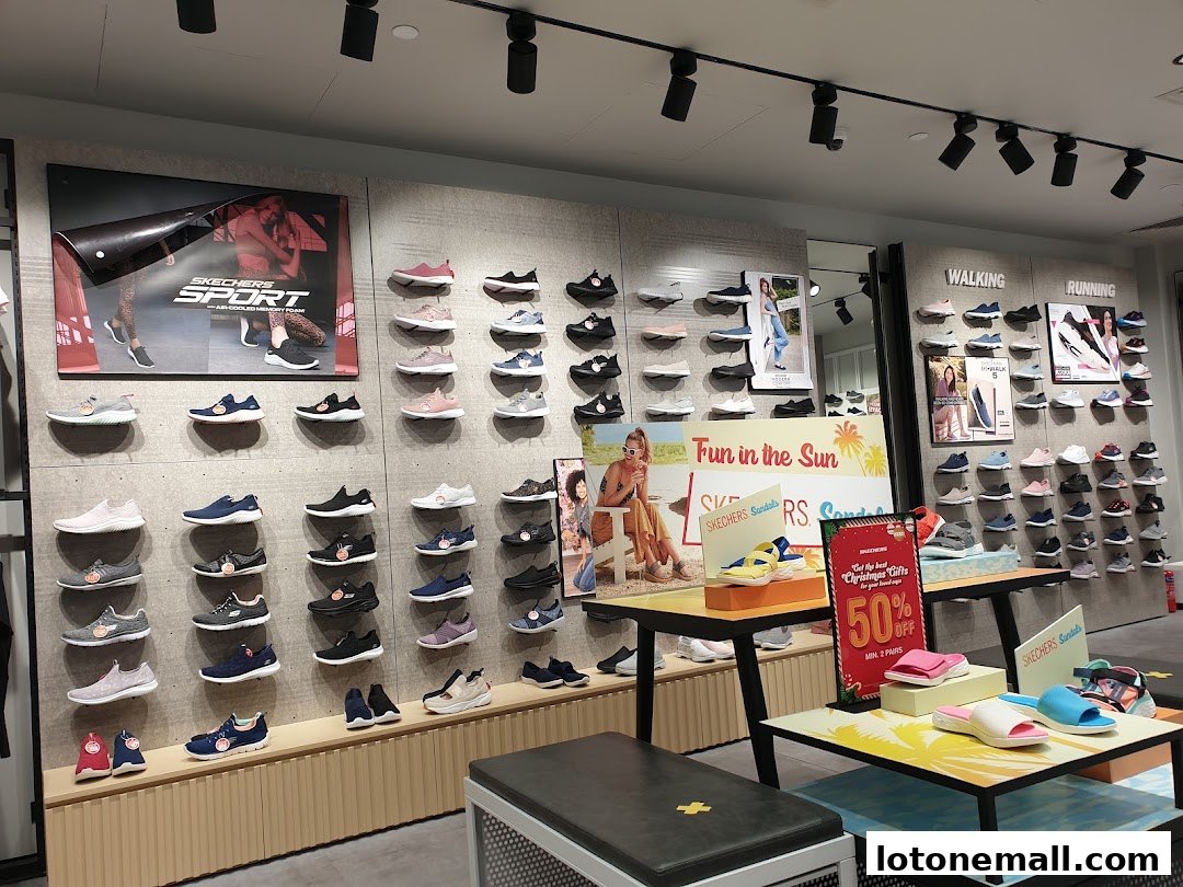 Interior view of a Skechers store showcasing a wide variety of athletic and casual footwear.
