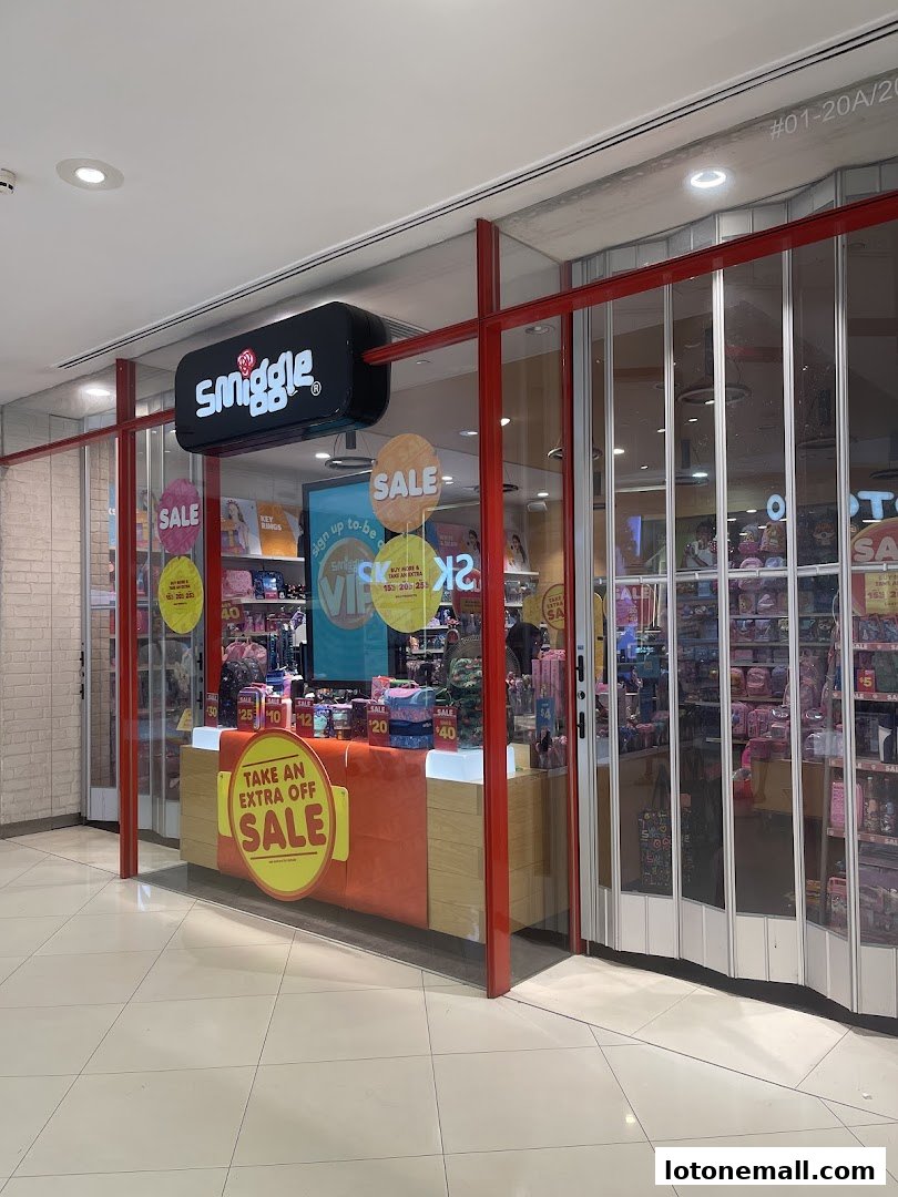 The Smiggle shop front displays colorful bags and accessories with a prominent sale sign.