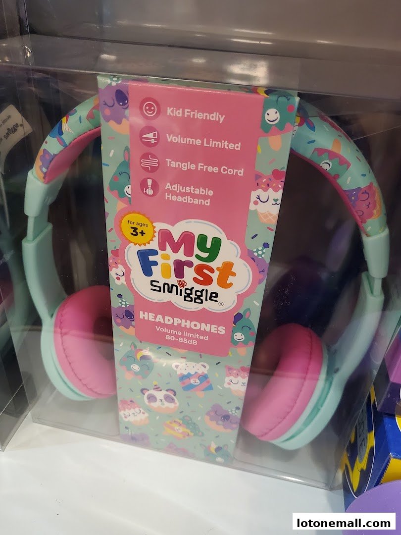 A pair of colorful, kid-friendly headphones from Smiggle, featuring a fun, patterned design.