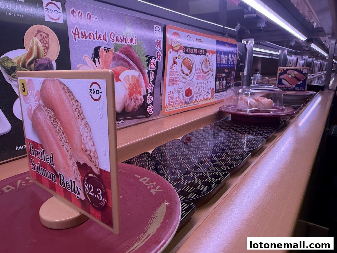 A conveyor belt sushi restaurant with various sushi dishes and menu displays.