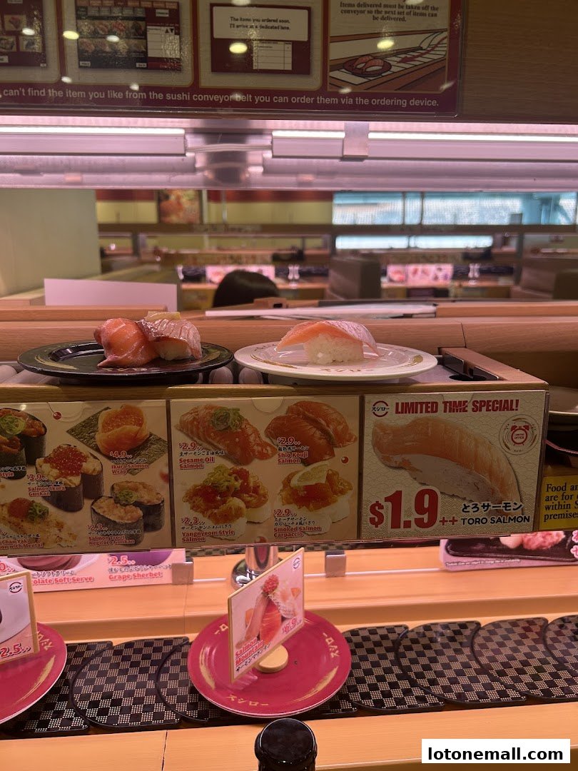 Sushiro Lot One conveyor belt sushi with various salmon dishes and a special offer.