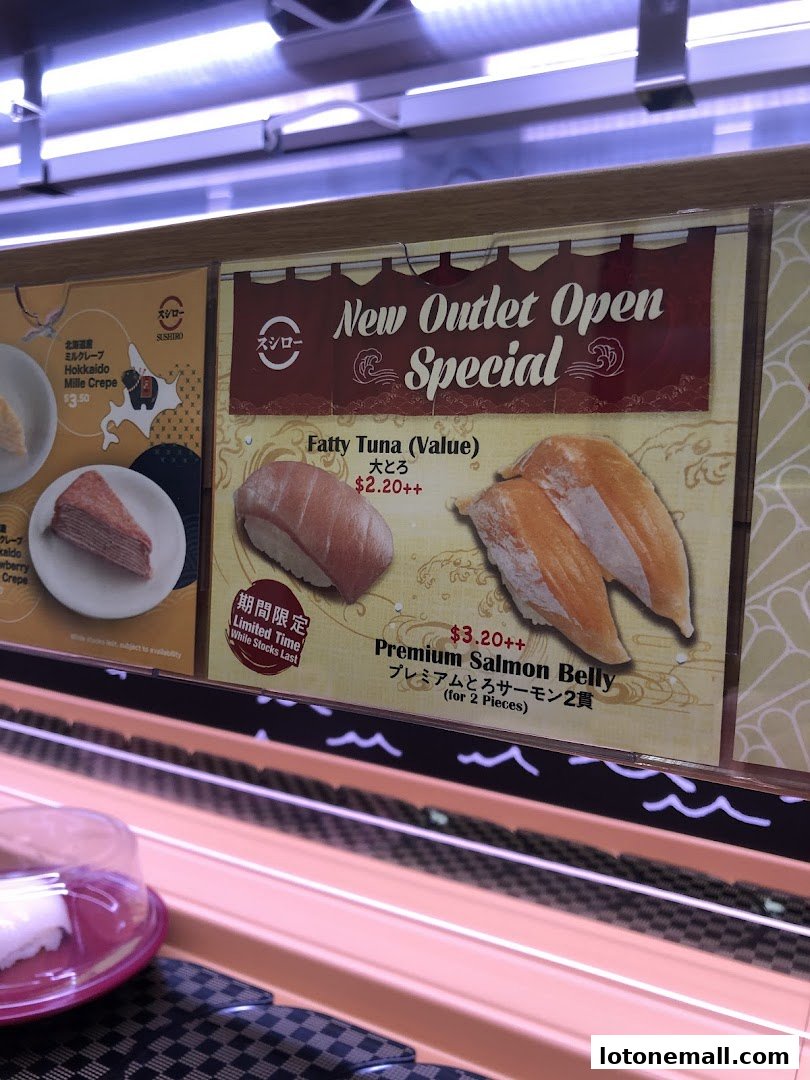 A sign advertising Sushiro's New Outlet Open Special featuring Fatty Tuna and Premium Salmon Belly sushi.