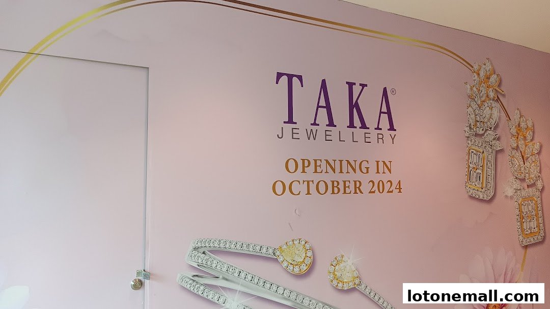 A wall graphic announcing the opening of TAKA Jewellery in October 2024, featuring jewelry.
