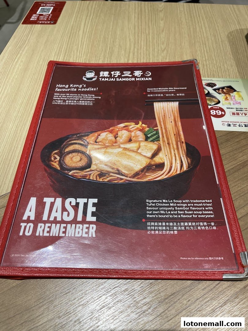 A menu from TamJai SamGor Mixian featuring a bowl of noodles and promotional text.