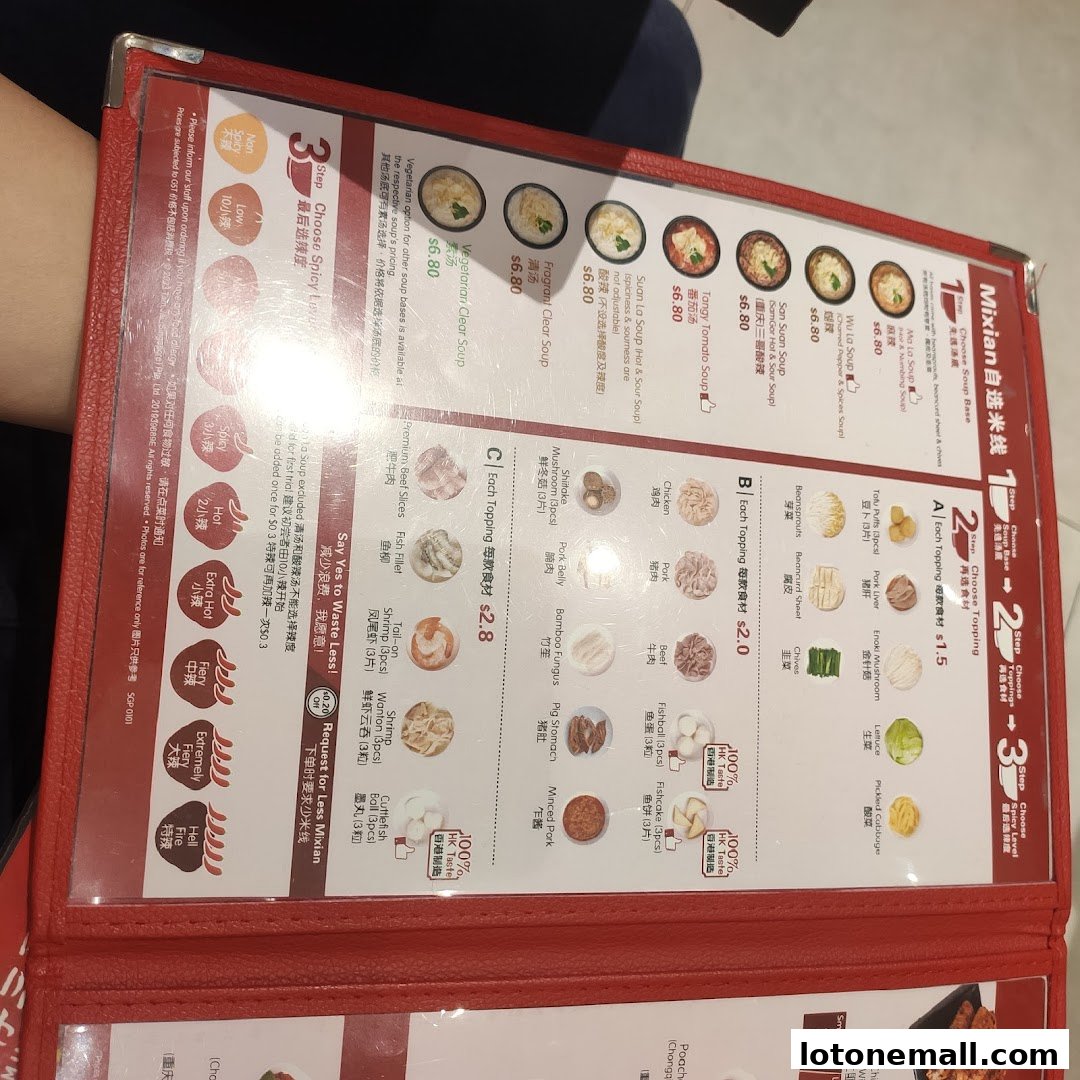 A menu for TamJai SamGor Mixian showing soup bases, toppings, and spice levels.