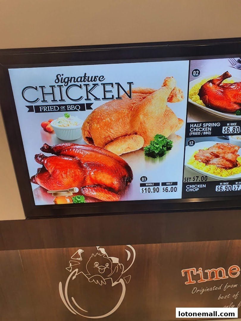 A digital menu board displaying signature fried or BBQ chicken dishes.