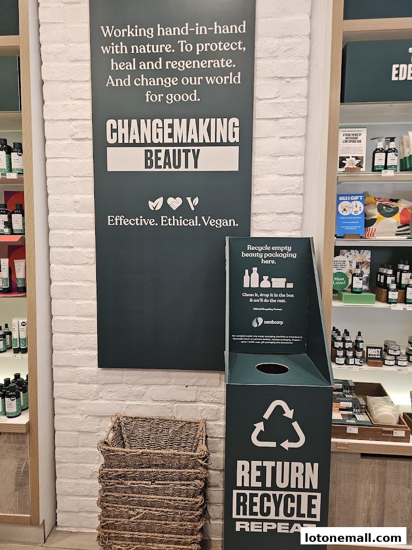 The Body Shop store interior with a focus on their 'Changemaking Beauty' campaign and recycling initiative.