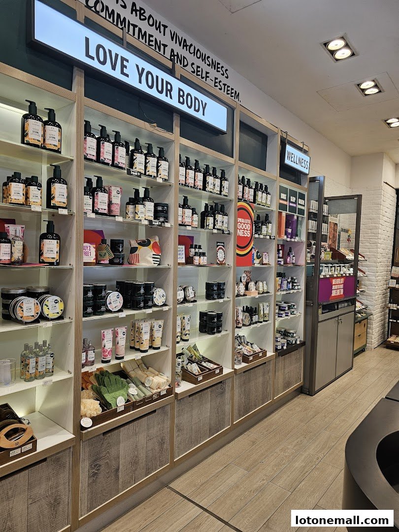 Interior view of The Body Shop, showcasing shelves stocked with various skincare and body care products.