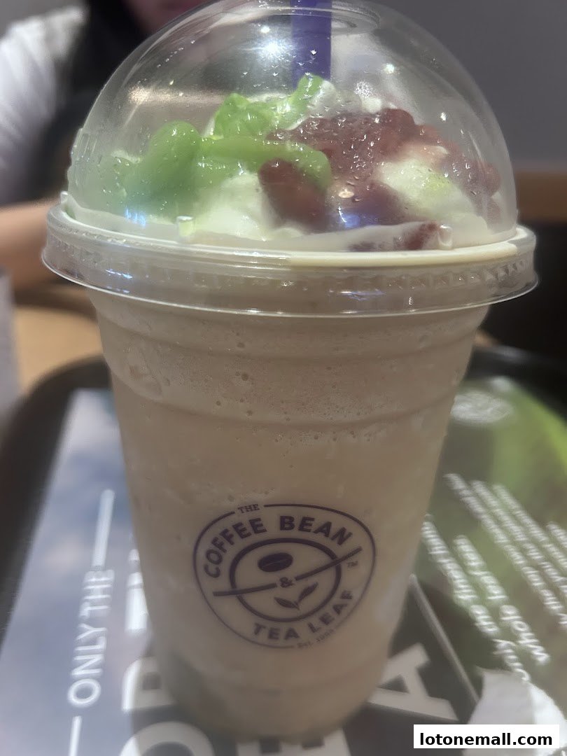 A close-up of a blended beverage from The Coffee Bean & Tea Leaf with toppings.