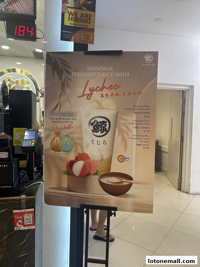 A promotional poster for The Whale Tea's seasonal fermented rice drinks with lychee.