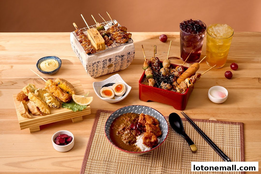 A spread of Japanese street food including yakitori skewers, tempura, curry rice, and drinks.