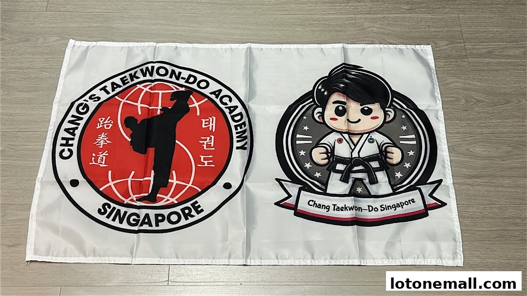 A white flag featuring the Chang's Taekwon-Do Academy logo and a cartoon taekwondo practitioner.